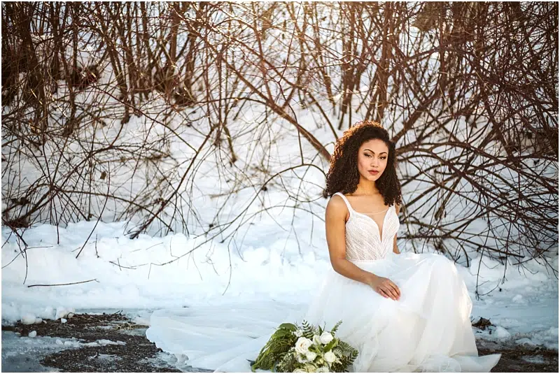 leavenworth winter wedding styled shoot at silvara winery black bride in a blue wedding gown from french knot couture