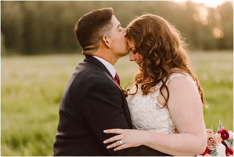 marionfield farm wedding sunset photos of bride and groom with bridal bouquet