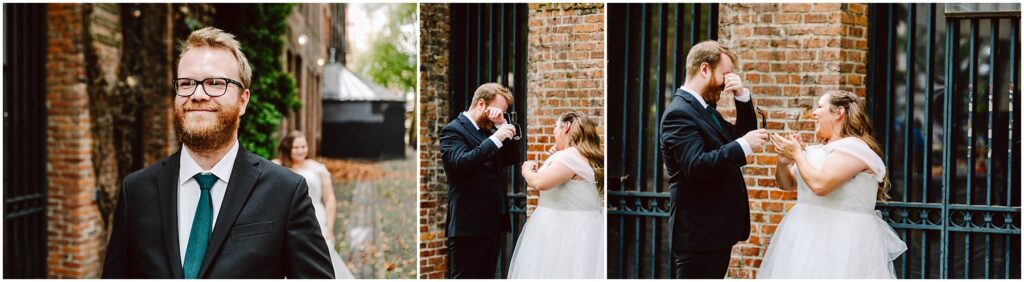 Snohomish Wedding Photographer GSquared Weddings A groom in a suit and tie awaits his bride during a first-look moment. The bride approaches, and they share a joyful reaction outside next to a brick wall and metal fence. The groom looks surprised and emotional as they both smile. Serving Seattle, Snohomish and Orlando