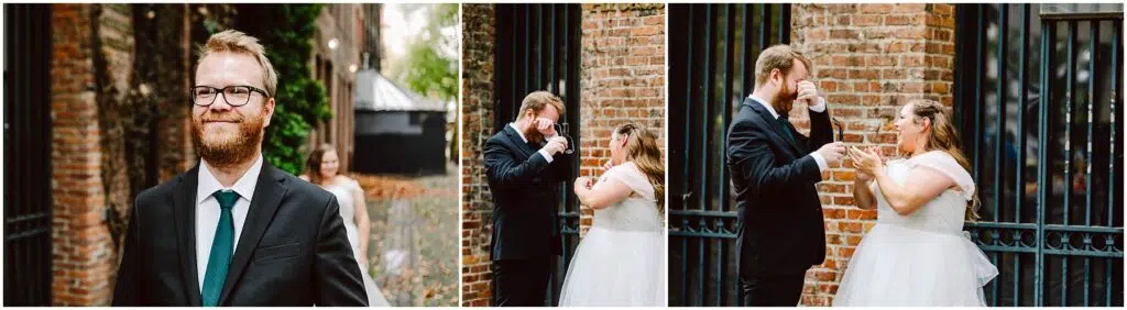 Snohomish Wedding Photographer GSquared Weddings A groom in a suit and tie awaits his bride during a first-look moment. The bride approaches, and they share a joyful reaction outside next to a brick wall and metal fence. The groom looks surprised and emotional as they both smile. Serving Seattle, Snohomish and Orlando