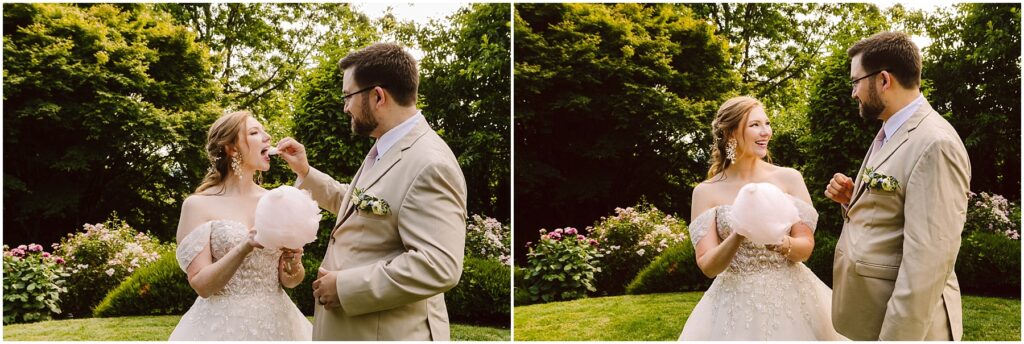 Snohomish Wedding Photographer GSquared Weddings A bride and groom stand outdoors, surrounded by lush greenery and blooming flowers. They are laughing and playfully sharing cotton candy. The bride is in an off-shoulder wedding dress, and the groom is wearing a beige suit. Serving Seattle, Snohomish and Orlando