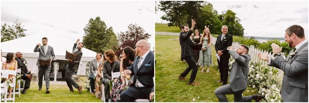 Snohomish Wedding Photographer GSquared Weddings Groomsmen dressed in suits dance down the aisle, high-fiving guests seated on either side. In the background, bridesmaids and groomsmen laugh and cheer. The setting is an outdoor wedding with a white tent and floral arrangements. Serving Seattle, Snohomish and Orlando