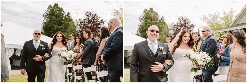 Snohomish Wedding Photographer GSquared Weddings A bride walks down the aisle outdoors, accompanied by a man in a suit. She carries a bouquet of white flowers, smiling. Guests in formal attire watch and smile. Trees and a large white tent are in the background. Serving Seattle, Snohomish and Orlando