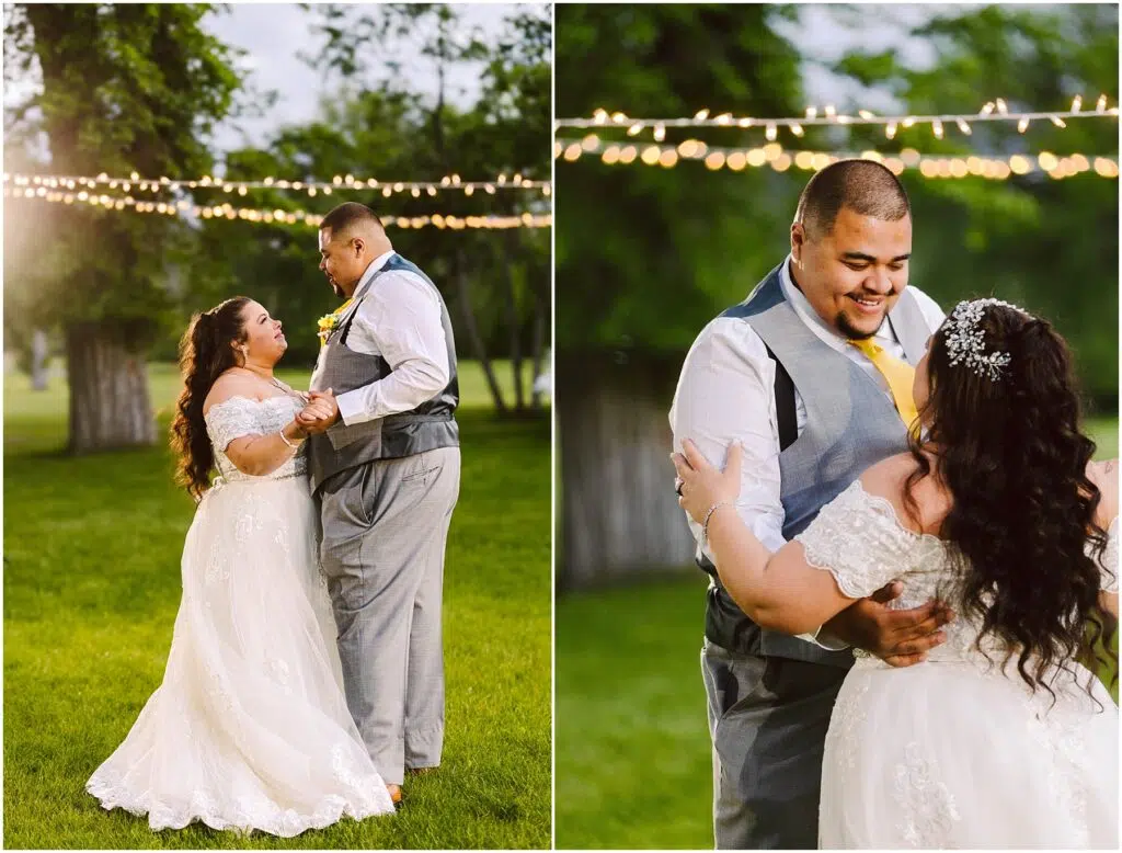 Snohomish Wedding Photographer GSquared Weddings A bride and groom dance outdoors on grass, surrounded by string lights. The bride wears a white gown with lace details, and the groom is in a gray suit with a yellow tie. Both are smiling and looking at each other lovingly. Trees are in the background. Serving Seattle, Snohomish and Orlando