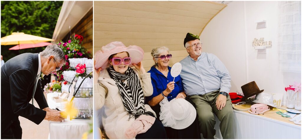 Snohomish Wedding Photographer GSquared Weddings Man in suit writes on paper at outdoor table with flowers and umbrella. Inside, three adults sit on a bench in playful hats and glasses, holding props, with more hats nearby. Wall decor and shelves add a cozy touch. Serving Seattle, Snohomish and Orlando