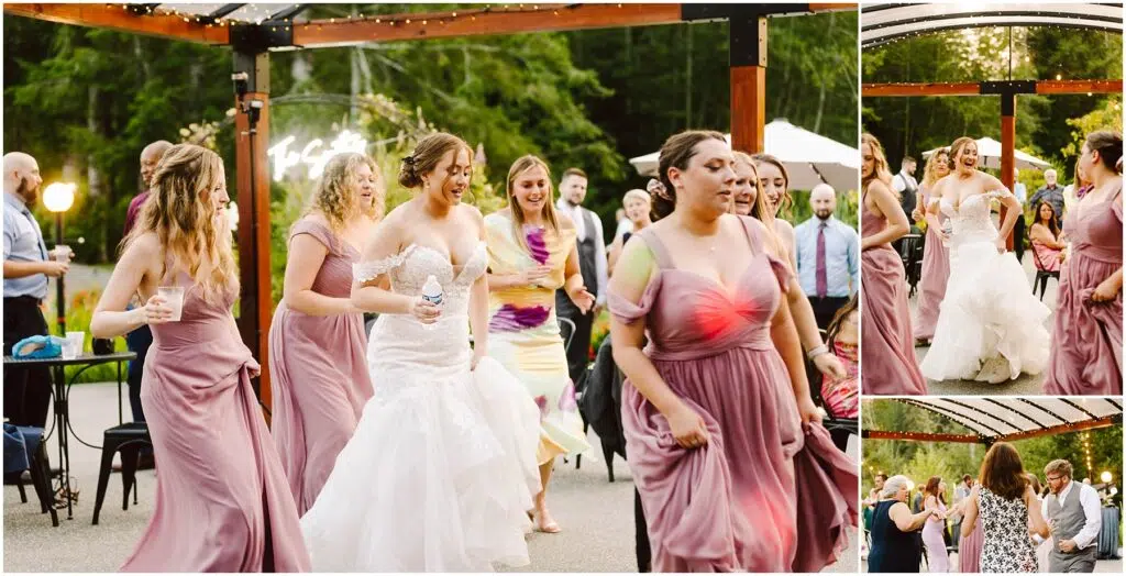 Snohomish Wedding Photographer GSquared Weddings A bride in a white gown dances joyfully with bridesmaids in mauve dresses at an outdoor wedding reception. Guests in formal attire gather around under a wooden pergola, with greenery and soft lights in the background. Serving Seattle, Snohomish and Orlando