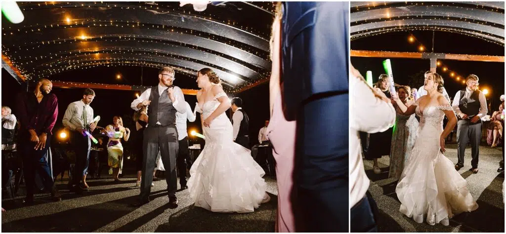 Snohomish Wedding Photographer GSquared Weddings A bride in a white dress and groom in a vest dance joyfully under a canopy decorated with string lights. Guests around them enjoy the lively atmosphere, some holding glow sticks. The scene captures a festive outdoor wedding reception. Serving Seattle, Snohomish and Orlando