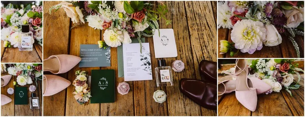 Snohomish Wedding Photographer GSquared Weddings Flat lay of wedding items on a wooden surface, including floral arrangements, a perfume bottle, wedding invitations with initials A + S, pink heels, brown shoes, a ring box with a wedding band, and decorative greenery. Serving Seattle, Snohomish and Orlando