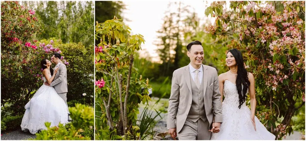 Snohomish Wedding Photographer GSquared Weddings A bride and groom stand in a lush garden filled with pink flowers. The groom, in a light gray suit, smiles as he holds the hand of the bride, who is in a strapless white gown. The couple walks joyfully under trees. Serving Seattle, Snohomish and Orlando