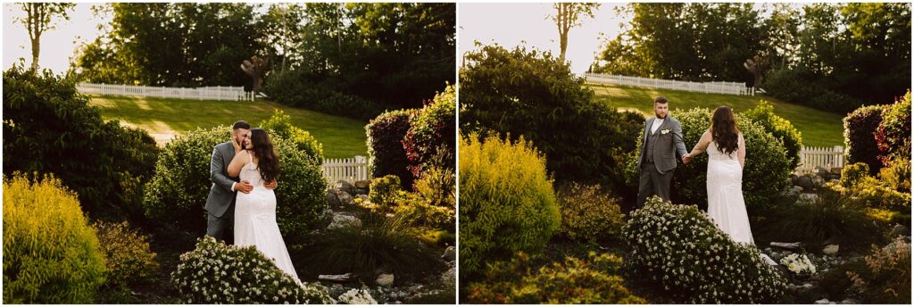 Snohomish Wedding Photographer GSquared Weddings A couple in wedding attire stands in a garden. The groom in a gray suit embraces the bride in a white dress in the first image, while they face each other in the second. The setting is lush with greenery and white flowers, and a white fence is visible. Serving Seattle, Snohomish and Orlando