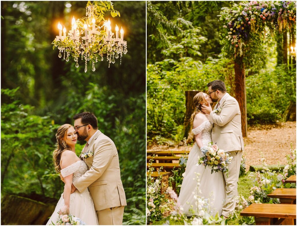 Snohomish Wedding Photographer GSquared Weddings A bride and groom in a woodland setting kiss under a chandelier and floral arch. The bride wears an off-shoulder gown and holds a bouquet. The groom wears a beige suit. They stand surrounded by greenery and flowers, with wooden benches nearby. Serving Seattle, Snohomish and Orlando