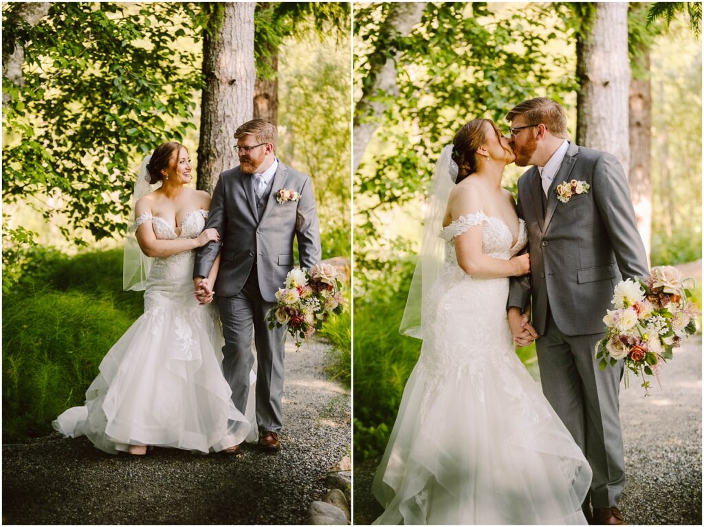 Snohomish Wedding Photographer GSquared Weddings A bride and groom in formal attire share a kiss and walk hand in hand on a wooded path. The bride holds a bouquet of flowers and wears a white gown, while the groom wears a gray suit. Sunlight filters through the trees, creating a serene backdrop. Serving Seattle, Snohomish and Orlando