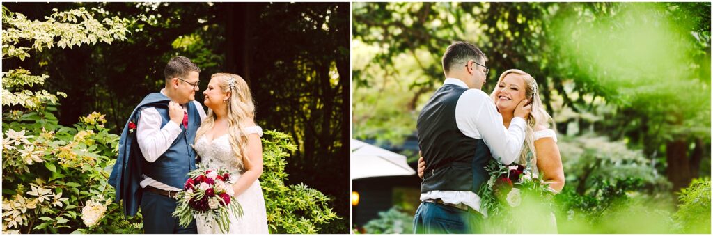 Snohomish Wedding Photographer GSquared Weddings Couple in wedding attire stands in a garden. The groom wears glasses and a vest, holding his jacket, and the bride, in a lace gown, holds a bouquet. Both are smiling and sharing an intimate moment, surrounded by greenery and sunlight. Serving Seattle, Snohomish and Orlando