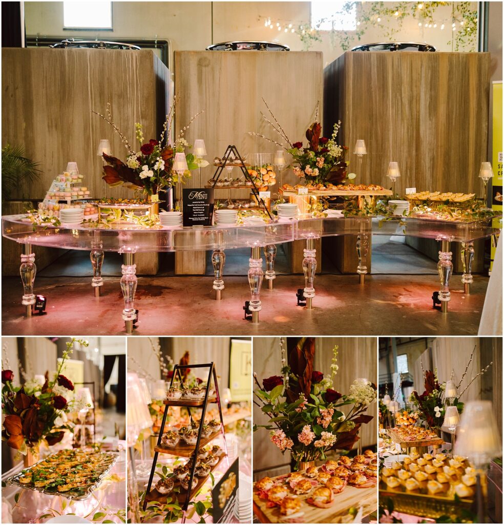 Snohomish Wedding Photographer GSquared Weddings An elegant buffet setup with a variety of gourmet appetizers displayed on glass tables. Decorative florals and candles enhance the presentation. The arrangement includes tiered trays with assorted finger foods, pastries, and a central menu board. Serving Seattle, Snohomish and Orlando