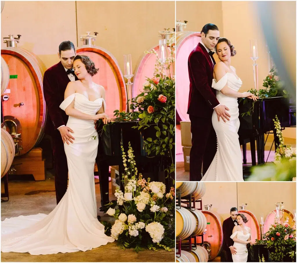 Snohomish Wedding Photographer GSquared Weddings A couple poses elegantly in a wine cellar. The woman, in a flowing white gown, and the man, in a velvet suit, embrace beside a piano adorned with flowers. Large wine barrels fill the backdrop, adding rustic charm to the romantic setting. Serving Seattle, Snohomish and Orlando