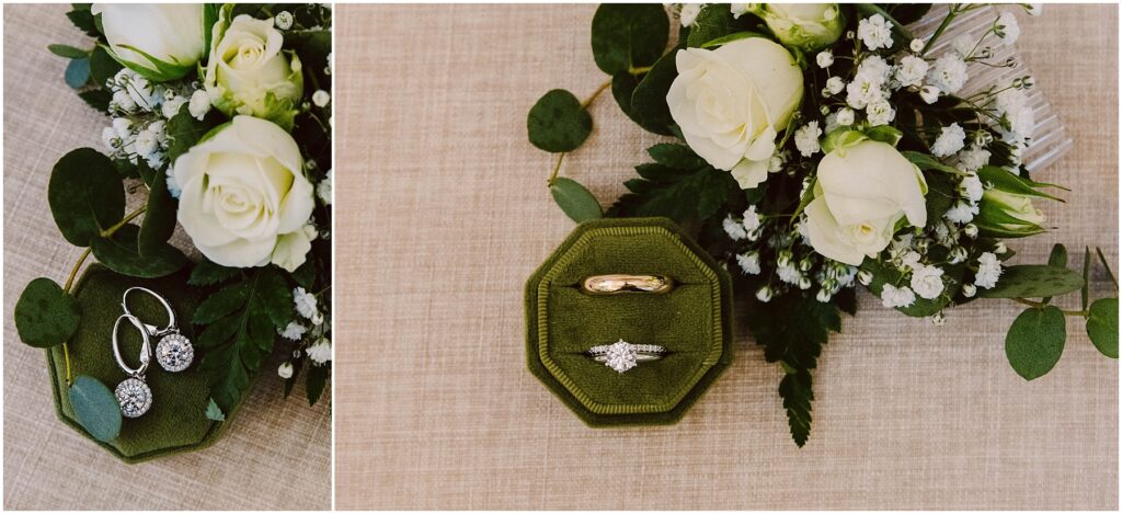 Snohomish Wedding Photographer GSquared Weddings A green velvet box displaying a diamond ring and a gold band is placed between bouquets of white roses and greenery. Silver earrings adorned with sparkling stones are next to one of the bouquets on a beige textured surface. Serving Seattle, Snohomish and Orlando