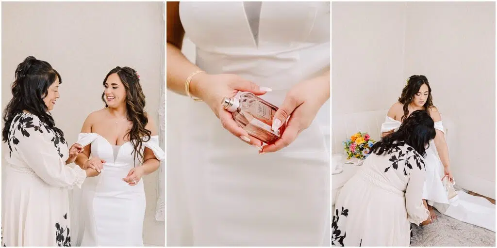 Snohomish Wedding Photographer GSquared Weddings A bride in a white gown with off-the-shoulder sleeves shares a moment with a woman in a floral dress, reminiscent of serene Machias sunsets. She holds a perfume bottle and later adjusts her shoe near a bouquet of colorful flowers on the sofa. Serving Seattle, Snohomish and Orlando