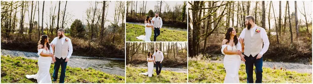 Snohomish Wedding Photographer GSquared Weddings A couple in wedding attire strolls along the grassy riverbank in Machias. The bride, in a white dress holding a bouquet, walks beside the groom sporting a white shirt and vest. Theyre framed by bare trees under a bright, clear sky. Serving Seattle, Snohomish and Orlando
