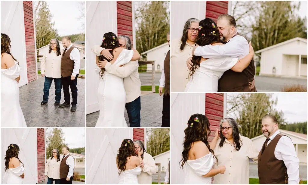 Snohomish Wedding Photographer GSquared Weddings A bride in a white dress with floral hair accessories hugs two individuals, a woman and a man, outside a red and white barn in Machias. They all share smiles and embrace in heartfelt poses against a backdrop of trees and a light-colored building. Serving Seattle, Snohomish and Orlando
