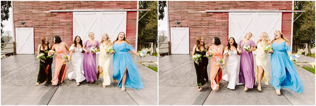 Snohomish Wedding Photographer GSquared Weddings Five women in colorful dresses stroll together, smiling and holding bouquets. They pose in front of a red wooden barn with white sliding doors—a charming scene reminiscent of Machias. The paved ground underfoot contrasts with the green trees and an overcast sky as their backdrop. Serving Seattle, Snohomish and Orlando