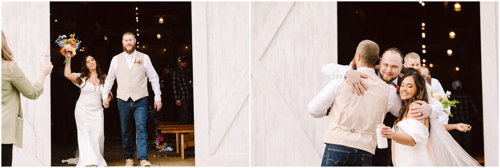 Snohomish Wedding Photographer GSquared Weddings A newlywed couple exits a barn in Machias, smiling and holding hands. The bride waves a vibrant bouquet as they are greeted by guests with hugs and joyful expressions, celebrating the occasion. Serving Seattle, Snohomish and Orlando