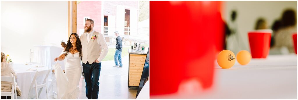 Snohomish Wedding Photographer GSquared Weddings A smiling couple, with the woman in a white dress and the man in a beige vest, enter a bright Machias-style space. Red cups and an orange ping pong ball are on a table in the foreground. Serving Seattle, Snohomish and Orlando