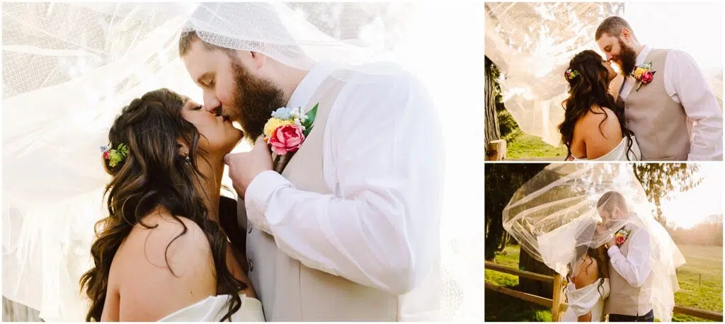 Snohomish Wedding Photographer GSquared Weddings A newlywed couple shares a romantic kiss under a flowing veil outdoors in Machias. The groom wears a beige suit and the bride, adorned with flowers in her hair, stands near a wooden fence surrounded by trees as the sun sets beautifully behind them. Serving Seattle, Snohomish and Orlando