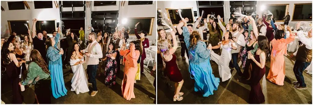 Snohomish Wedding Photographer GSquared Weddings At a lively wedding reception in Machias, guests dance energetically. People of all ages don formal attire, showcasing colorful dresses and suits. The bright room buzzes with joy as everyone holds sparklers aloft, creating a dazzling atmosphere. Serving Seattle, Snohomish and Orlando