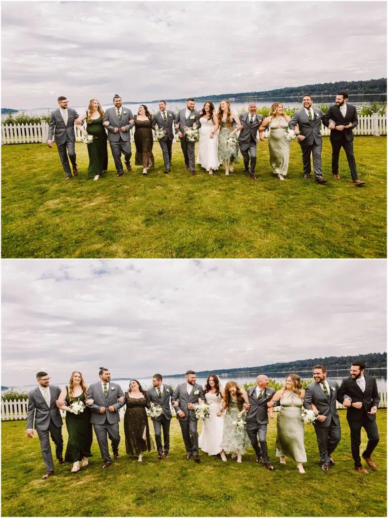 Snohomish Wedding Photographer GSquared Weddings A wedding party poses on a lush green lawn in Port Gamble with a scenic backdrop of hills and sky. The group, in formal attire, includes bridesmaids in green dresses and groomsmen in gray suits, flanking the bride in white and groom in black at this stunning summer wedding. Serving Seattle, Snohomish and Orlando