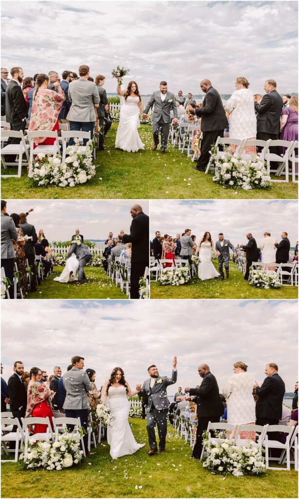 Snohomish Wedding Photographer GSquared Weddings A newlywed couple joyfully walks down the outdoor aisle in Port Gamble, lined with guests. The bride holds a bouquet, and the groom is shaking hands. White chairs and flowers adorn the path. Its a sunny summer day with scattered clouds. Serving Seattle, Snohomish and Orlando