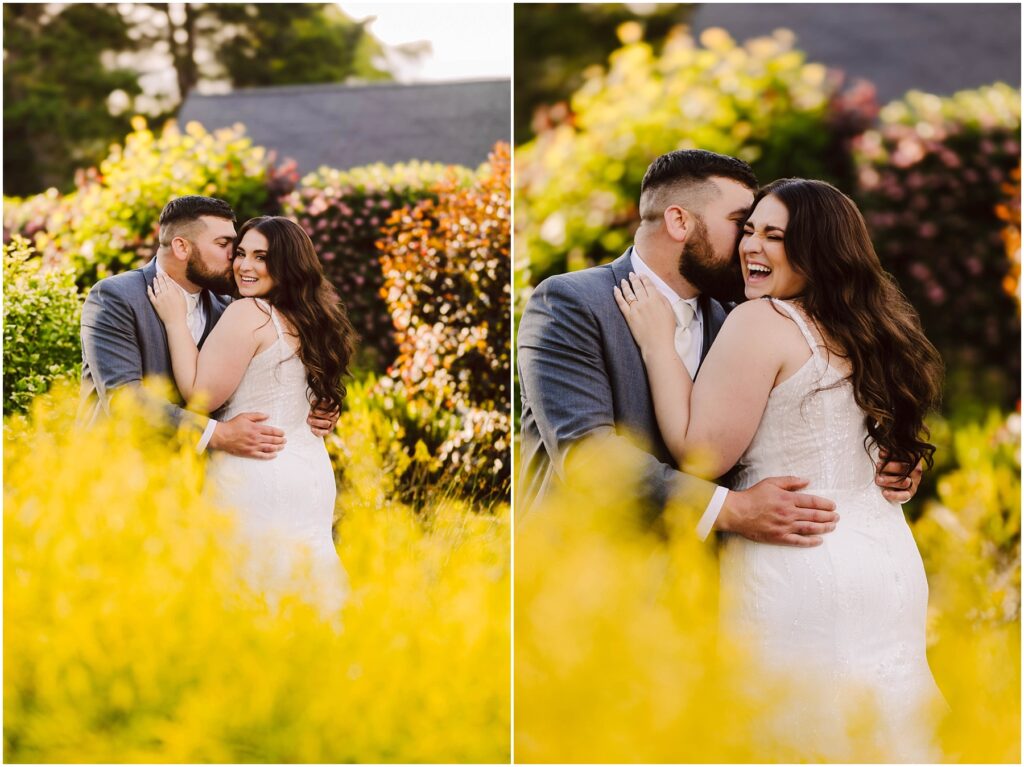 Snohomish Wedding Photographer GSquared Weddings In a Port Gamble garden, during their summer wedding filled with vibrant yellow flowers and lush greenery, a couple shares a joyful moment. The man in a gray suit whispers to the woman in a white dress, as they smile warmly at each other amidst the enchanting setting. Serving Seattle, Snohomish and Orlando