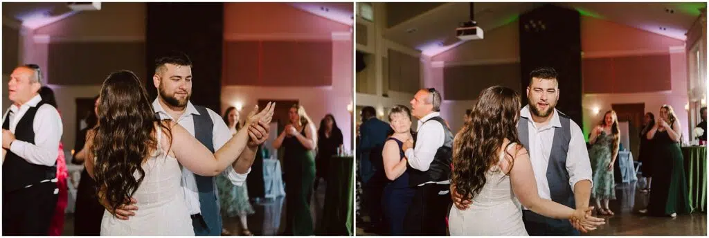 Snohomish Wedding Photographer GSquared Weddings A couple dances together in a warmly lit event hall during a beautiful Port Gamble summer wedding. The man, wearing a vest and open-collared shirt, and the woman, in a white dress, share a moment among others socializing in the background. Serving Seattle, Snohomish and Orlando