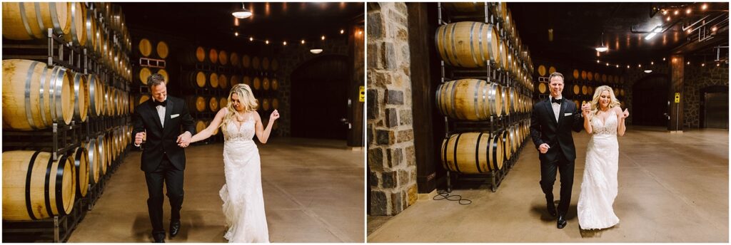 Snohomish Wedding Photographer GSquared Weddings A couple dressed in formal attire, with the woman in a white gown and the man in a black suit, joyfully hold hands and dance amid barrels lining the dimly lit winery. String lights twinkle above them as they revel in the romantic ambiance of the vineyard setting. Serving Seattle, Snohomish and Orlando