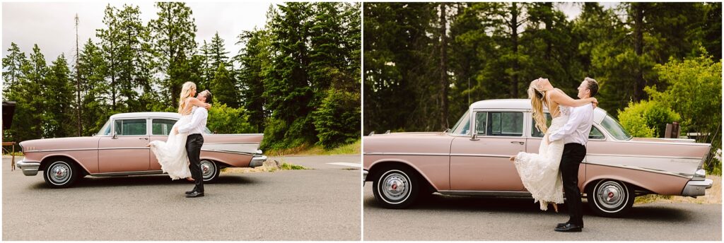 Snohomish Wedding Photographer GSquared Weddings A couple joyfully embraces in front of a vintage pink car at a charming winery. The person in the wedding dress is lifted off the ground playfully while the other smiles. Tall green trees frame the scene under a cloudy sky, adding to the enchanting atmosphere. Serving Seattle, Snohomish and Orlando
