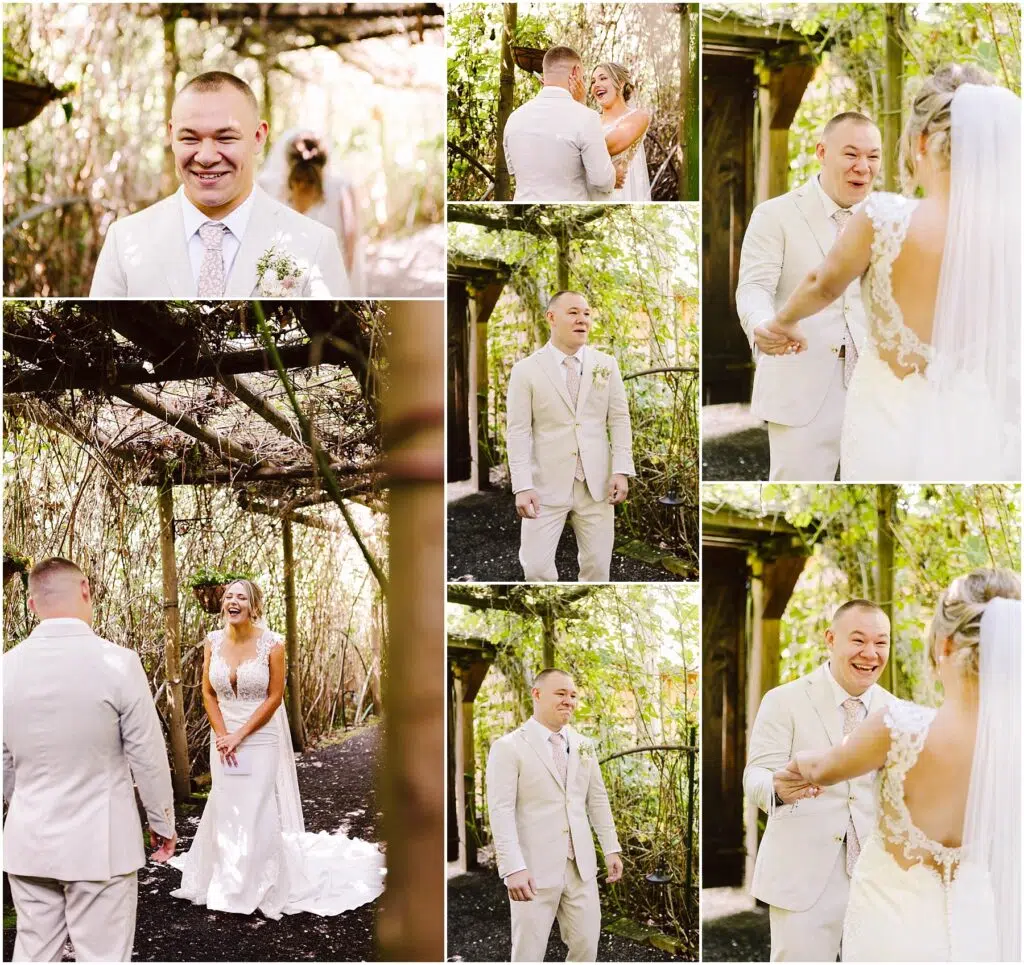 Snohomish Wedding Photographer GSquared Weddings In a Snohomish garden, a bride and groom share a joyful first look. The groom, in a light suit, reacts with surprise and happiness as he sees the bride in her white gown. They smile and embrace, surrounded by lush greenery and wooden arches. Serving Seattle, Snohomish and Orlando