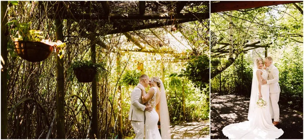 Snohomish Wedding Photographer GSquared Weddings In Snohomish, a bride and groom share a kiss under a lush, vine-covered wooden archway in the garden. Sunlight filters through the leaves, casting dappled light on the couple. The brides long veil flows gracefully as they both don light-colored attire. Serving Seattle, Snohomish and Orlando