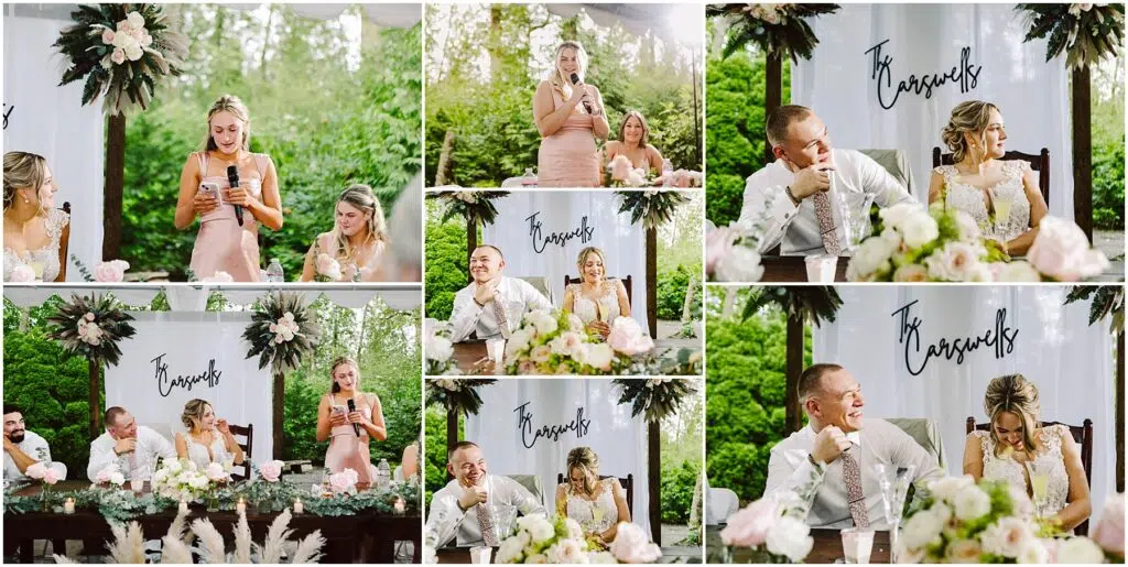 Snohomish Wedding Photographer GSquared Weddings A woman in a pink dress delivers a heartfelt speech, microphone in hand, at a Snohomish wedding. The bride and groom sit at a flower-adorned table, smiling and laughing under the Boswells sign. Lush greenery surrounds the charming outdoor setting. Serving Seattle, Snohomish and Orlando