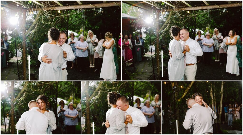 Snohomish Wedding Photographer GSquared Weddings A bride and groom dance outdoors under a pergola in Snohomish, surrounded by smiling guests. The couple embraces, sharing a lighthearted moment during their dance. Trees and joyful onlookers create a warm, intimate atmosphere. Serving Seattle, Snohomish and Orlando