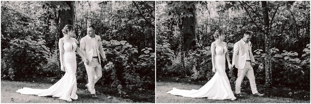 Snohomish Wedding Photographer GSquared Weddings A couple in wedding attire strolls through a Snohomish garden. The bride wears a long, elegant gown while the groom is in a light-colored suit. They hold hands and smile at each other, creating a timeless black-and-white scene. Serving Seattle, Snohomish and Orlando