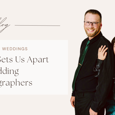 Snohomish Wedding Photographer GSquared Weddings A couple stands smiling against a plain background. The man wears a black suit with glasses, and the woman in a dark off-the-shoulder dress embraces his arm. Text reads: On the blog: GSquared Weddings - What Sets Us Apart as Wedding Photographers. Capture your special moments with us. Serving Seattle, Snohomish and Orlando